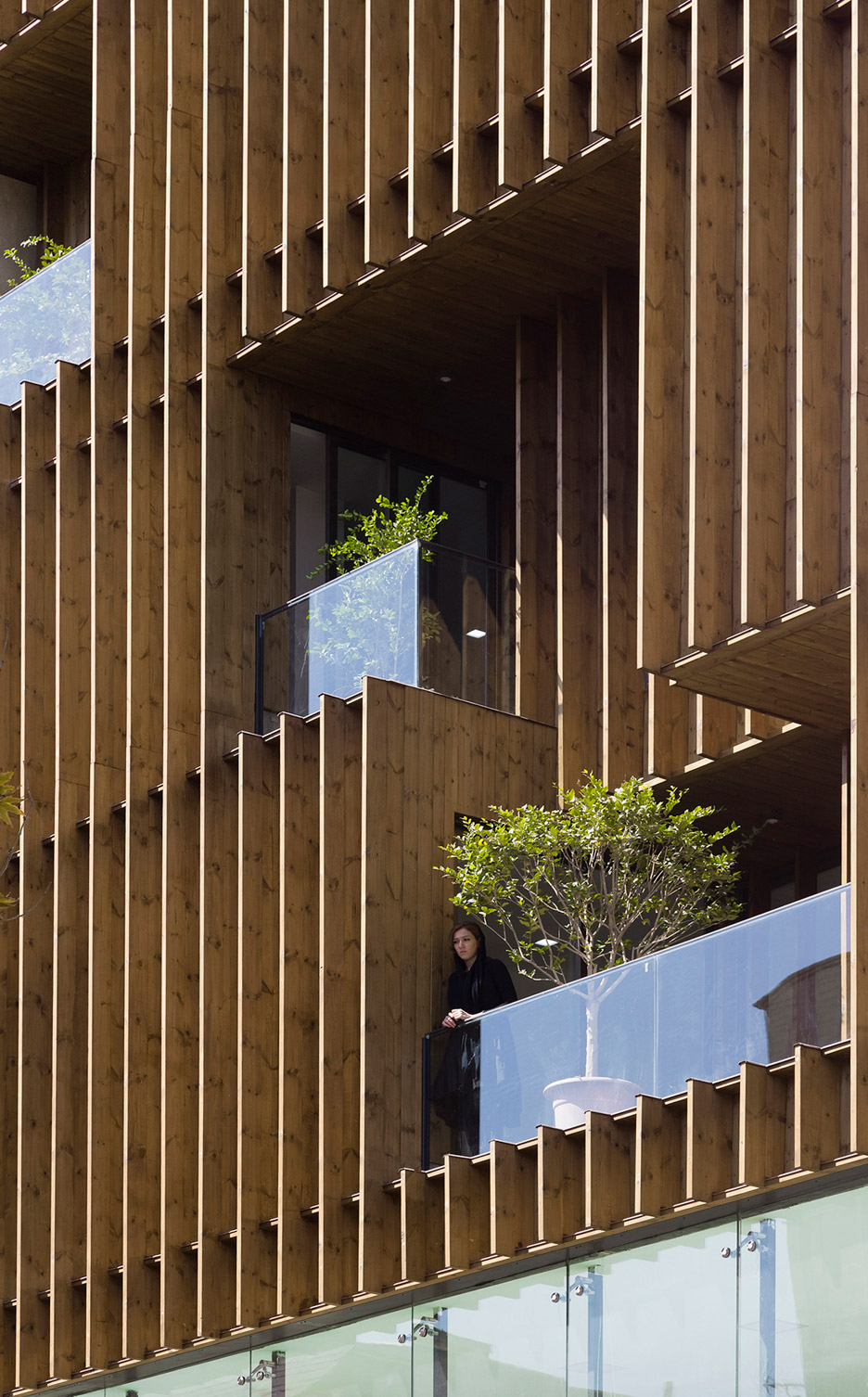 office-block-tehran-lp2-architecture-studio-iran-commercial-facade-connection-relationship-interior-exterior-wood_dezeen_936_0