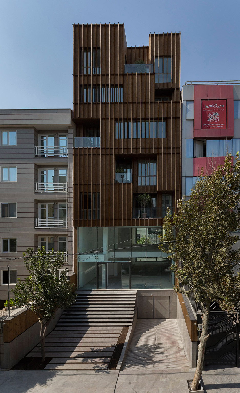 office-block-tehran-lp2-architecture-studio-iran-commercial-facade-connection-relationship-interior-exterior-wood_dezeen_936_3